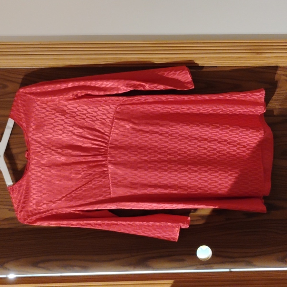 Cerise pink dress with pleated high waistline and fluted sleeves.UK brand